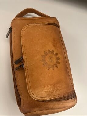 Source Unknown Tan Leather Toiletry Bag with Embossed Sun Motif